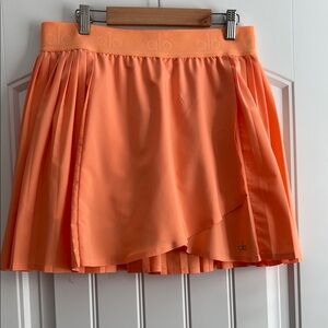 ALO Yoga Orange Asymmetrical Mini Skater Skirt